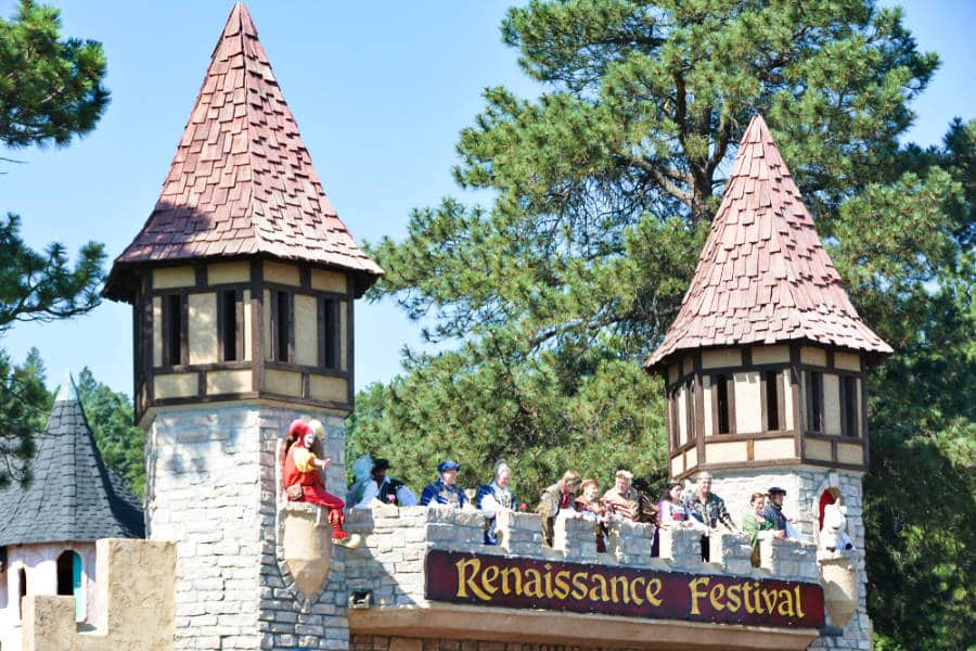 View of a castle with sculpted people during the Colorado Renaissance Festival