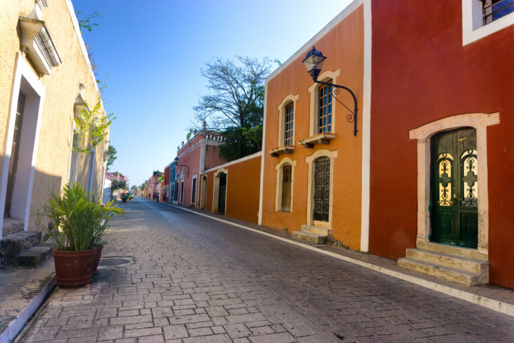 Colorful buildings lined on a street in Valladolid, Mexico