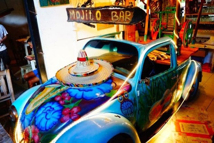 A colorful car display inside the mojito Bar