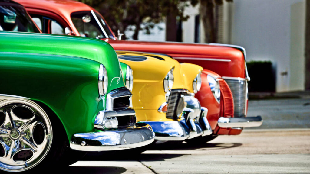 View of the colorful vintage cars' bumpers
