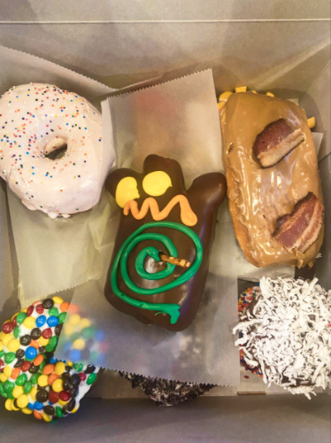 Closeup look at the colorful doughnuts from Voodoo Doughnut
