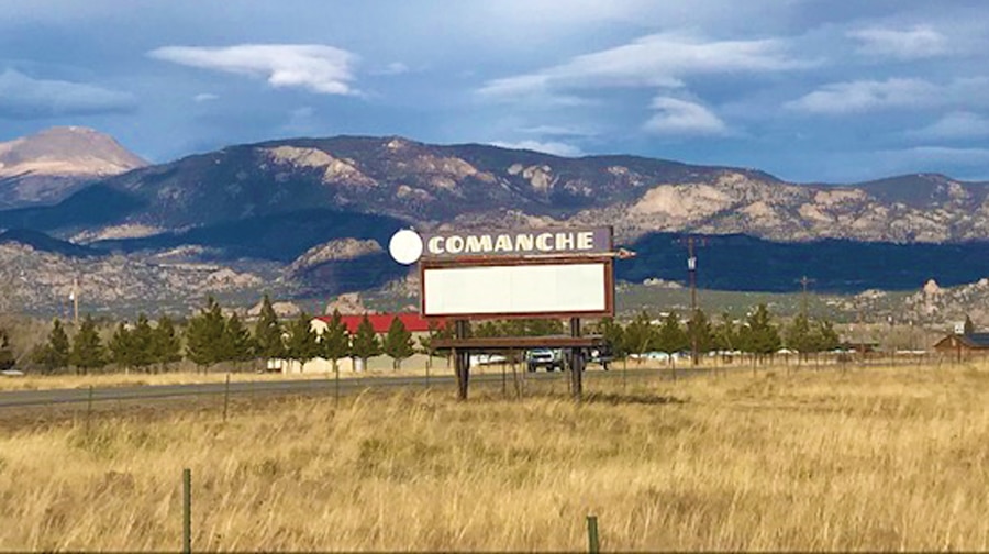 View of a welcoming sign from Comanche