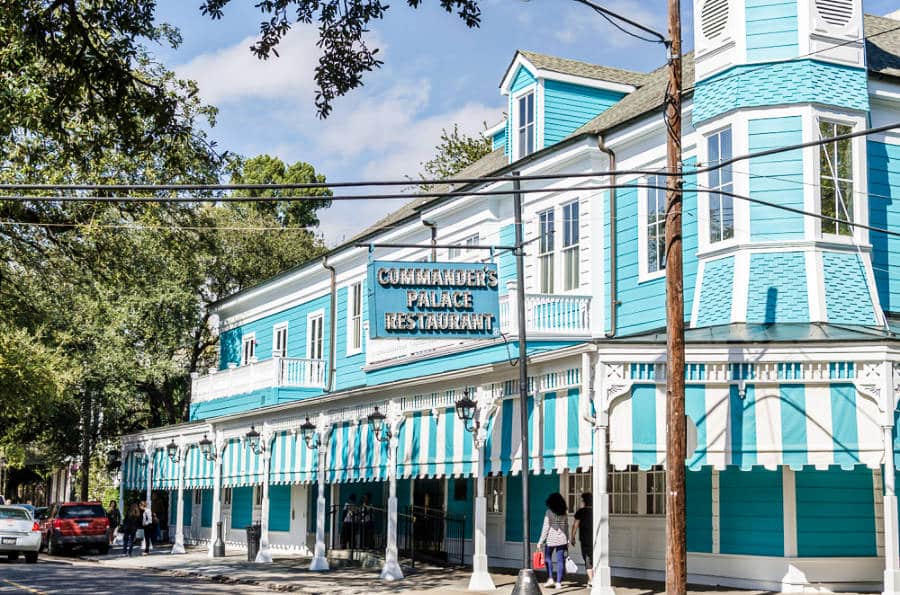 View of the turquoise blue french inspired exterior of Commander’s Palace