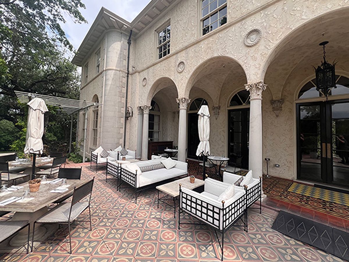 View of the seating area at the outdoor patio of Commodore Perry Estate