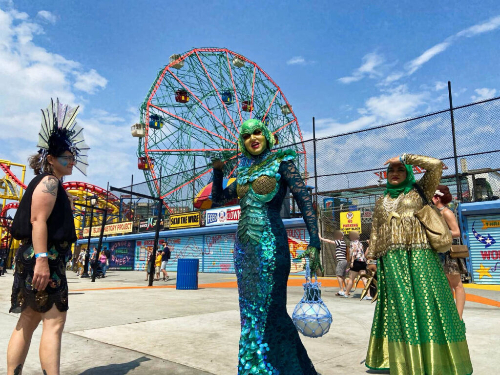 People wearing costumes at the Coney Island Mermaid Parade in 2023