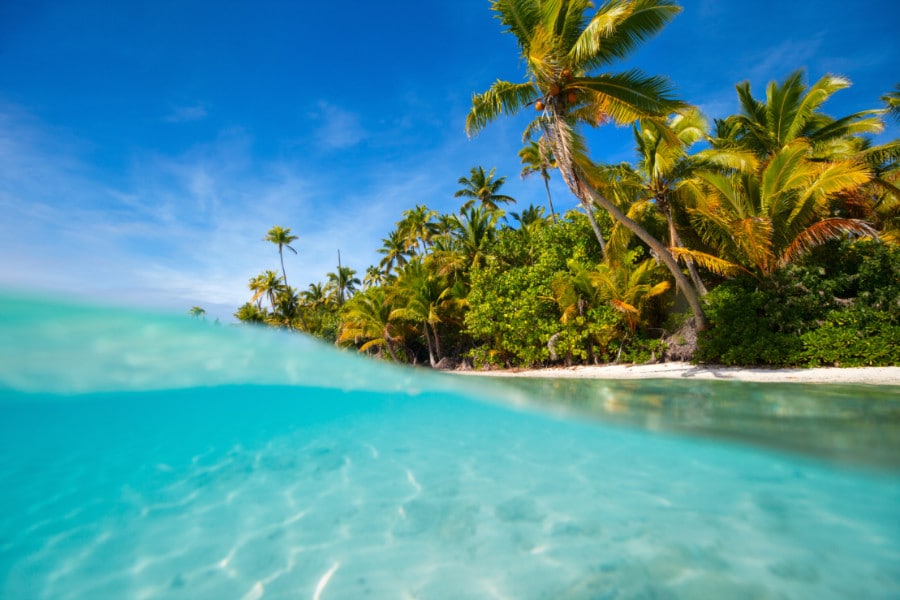 View of the island from under the water in Cook Islands Rarotonga Resorts
