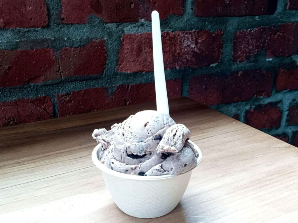 A cup of Cookies & Cream flavored ice cream from Earnest Ice Cream