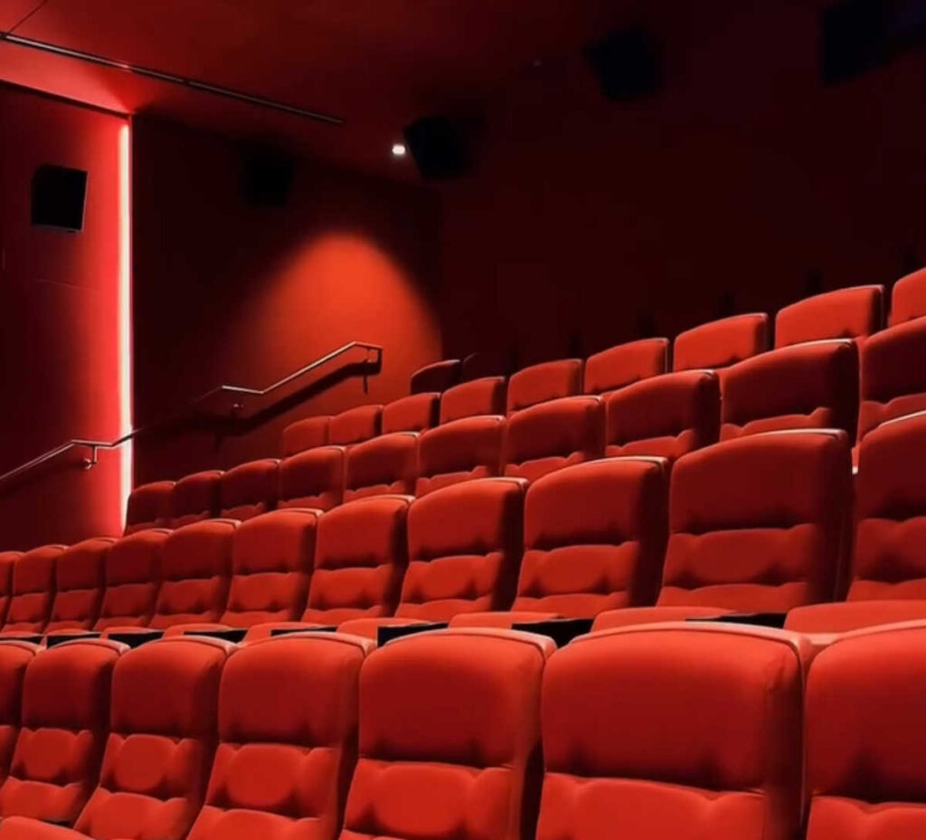 The plush red seating inside Coolidge Corner Theater