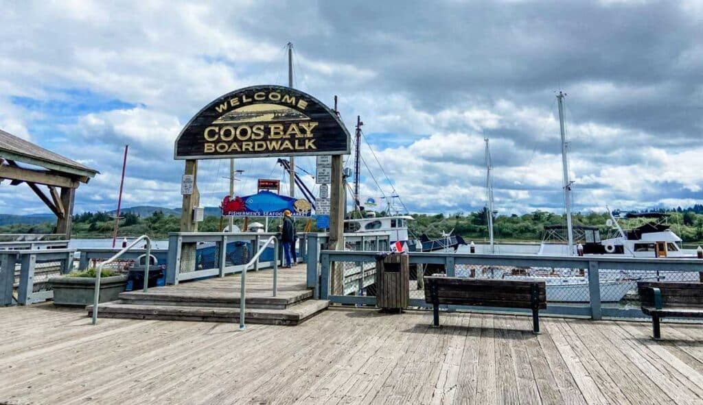A welcome sign at the entrance of the Coos Bay Boardwalk
