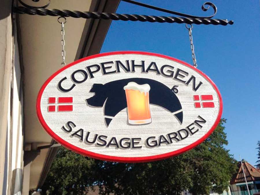 View of the Copenhagen Sausage Garden sign from the outside