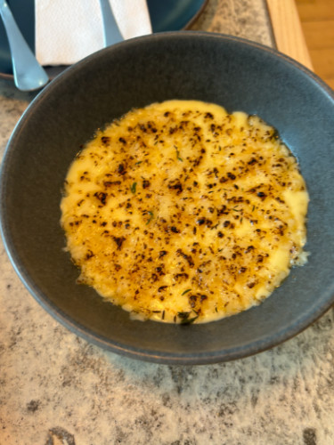 A bowl of Corn crème brûlée tapas from Bia Lounge