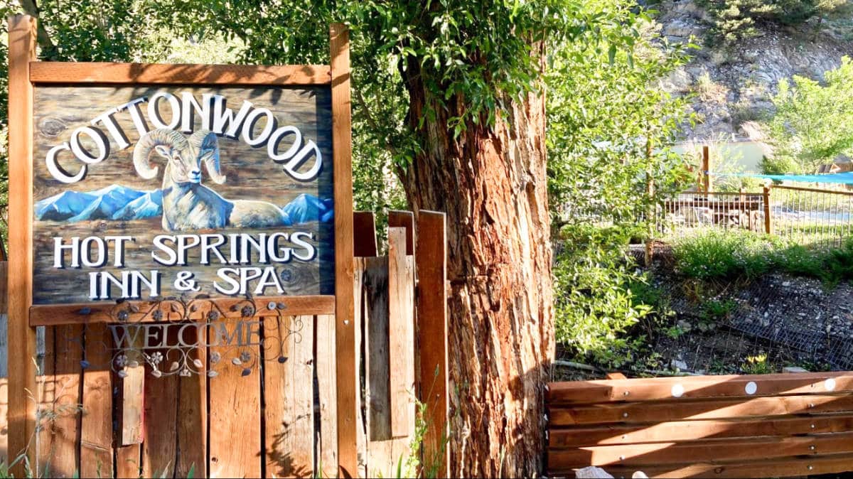 Closeup view of the "Cottonwood Hot Springs Inn & Spa" signage near the entrance