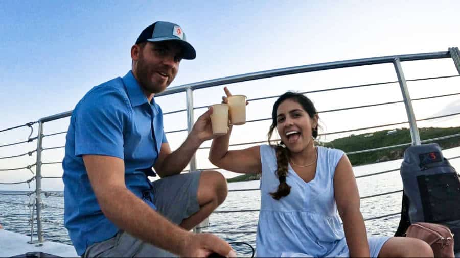 The author Andrew Bloem and his wife drinking on the boat