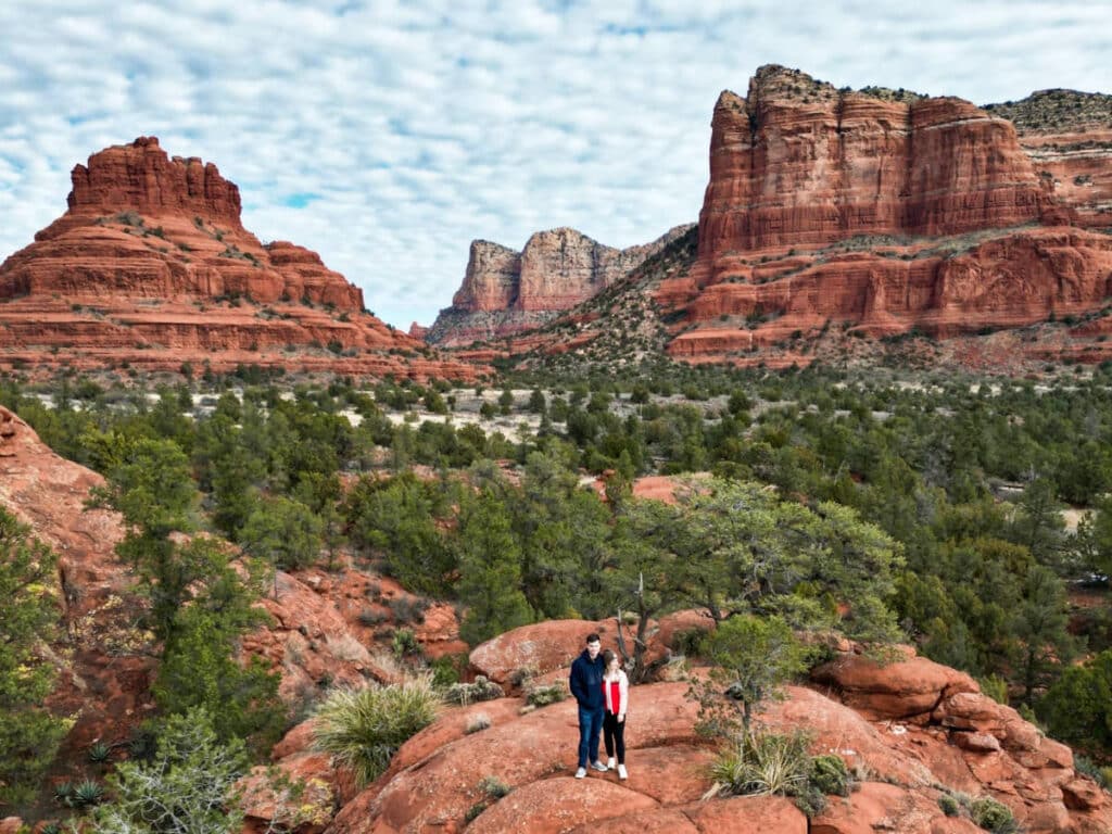 Aerial view of a couple posing for a photo at the picturesque Sedona