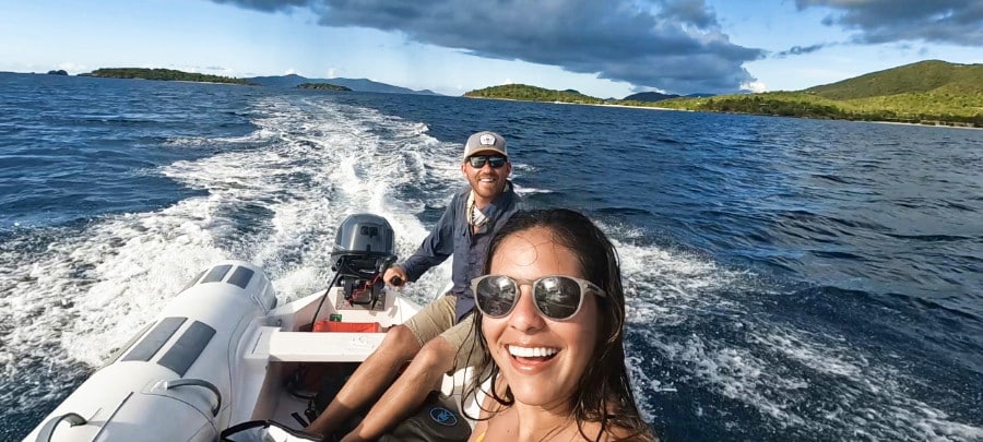The author Andrew Bloem and his wife riding the motorboat in US Virgin Islands