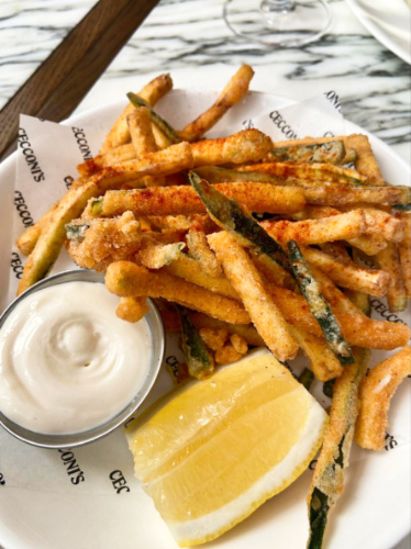 Closeup view of the courgette fritti with lemon and dip from Cecconi’s