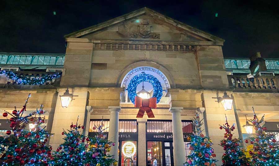 The Covent Garden Market from the outside with lights at night