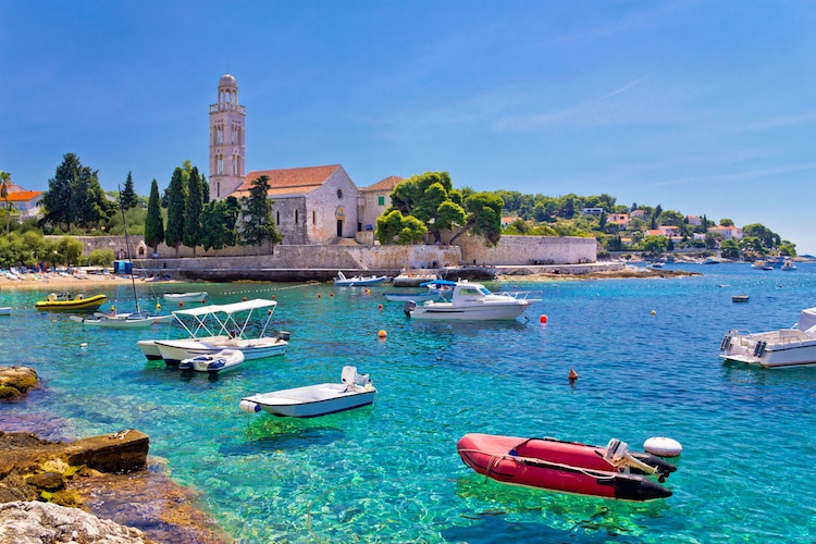 Turquoise sea of Hvar island, franciscian monastery view in Dalmatia