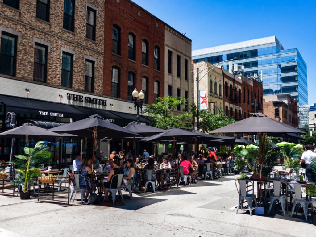 View of the crowd dining at the outdoor patio of the restaurants in River North