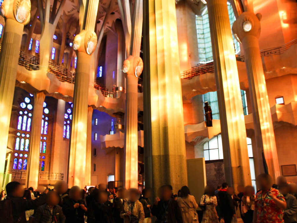 View of the crowd walking inside the La Sagrada Familia