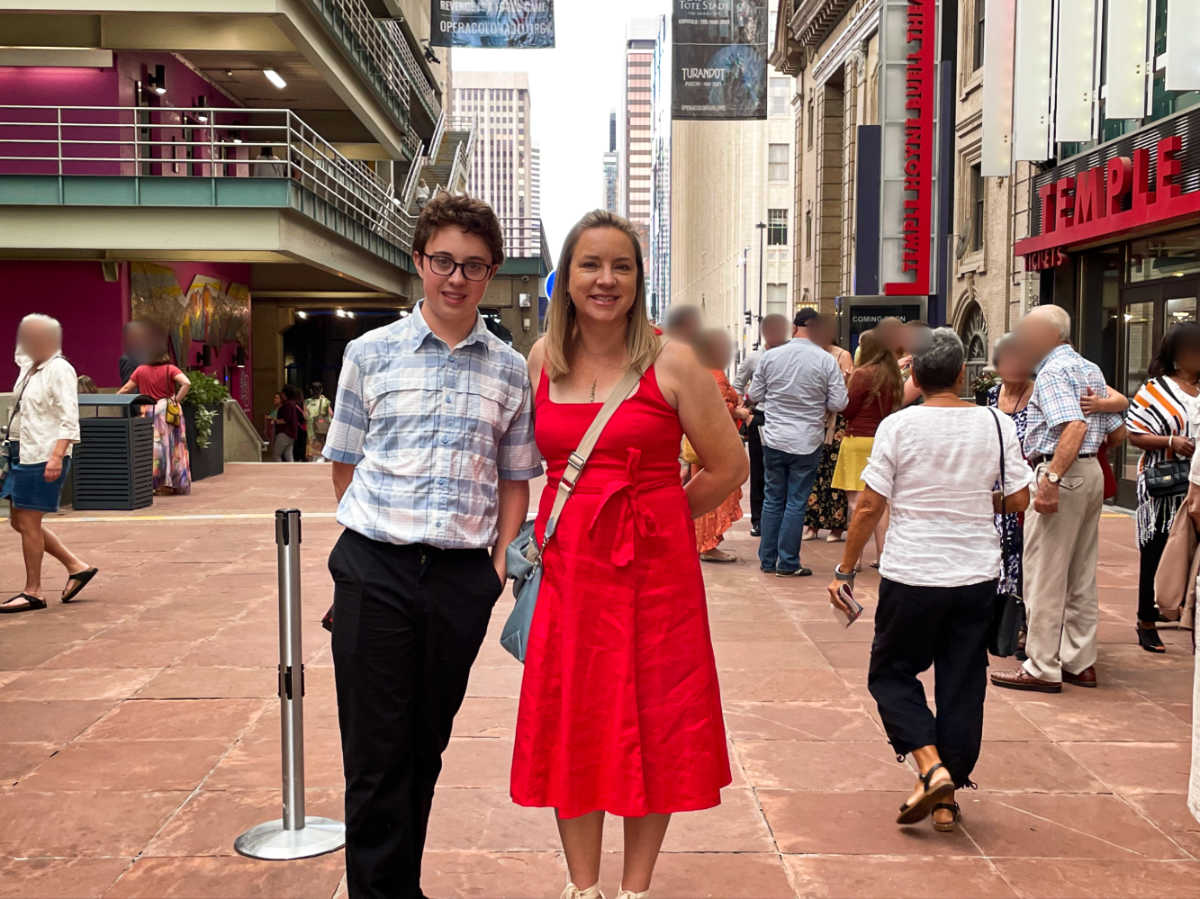 The author Laura Falin and her son outside the Denver Performing Arts Complex