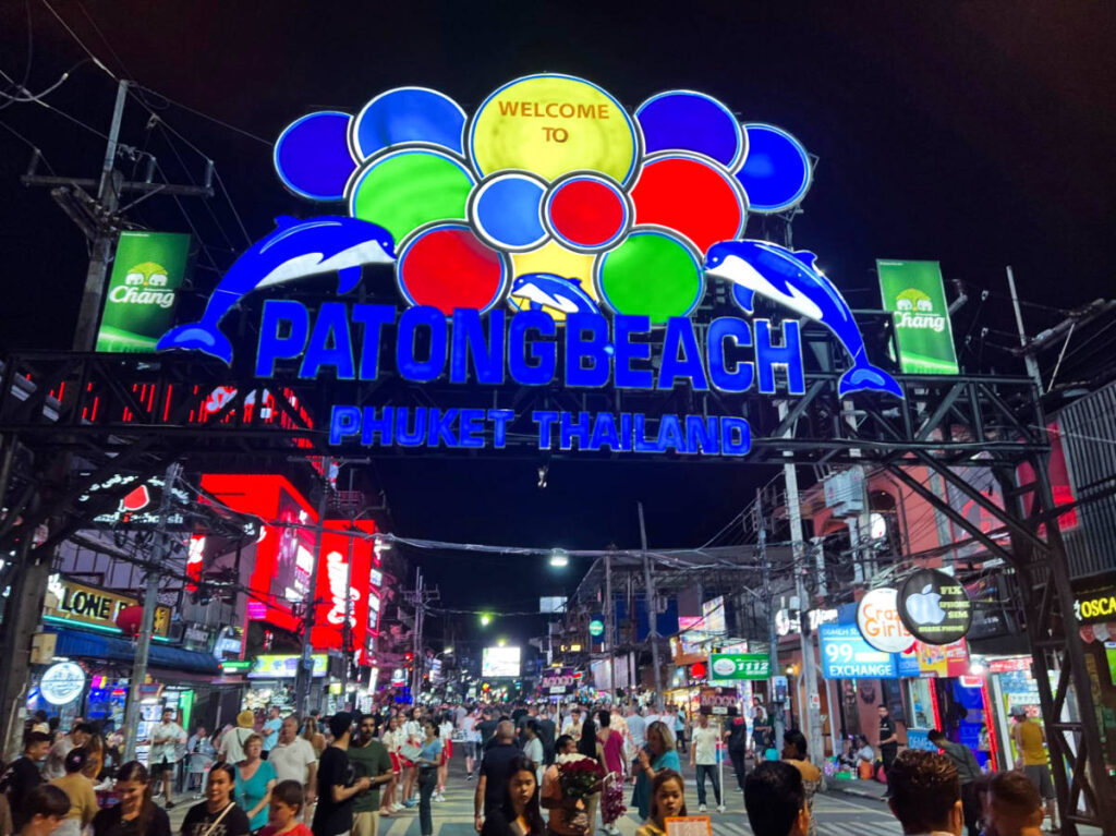 The arch sign of Patong Beach over the bustling Bangla Road at night