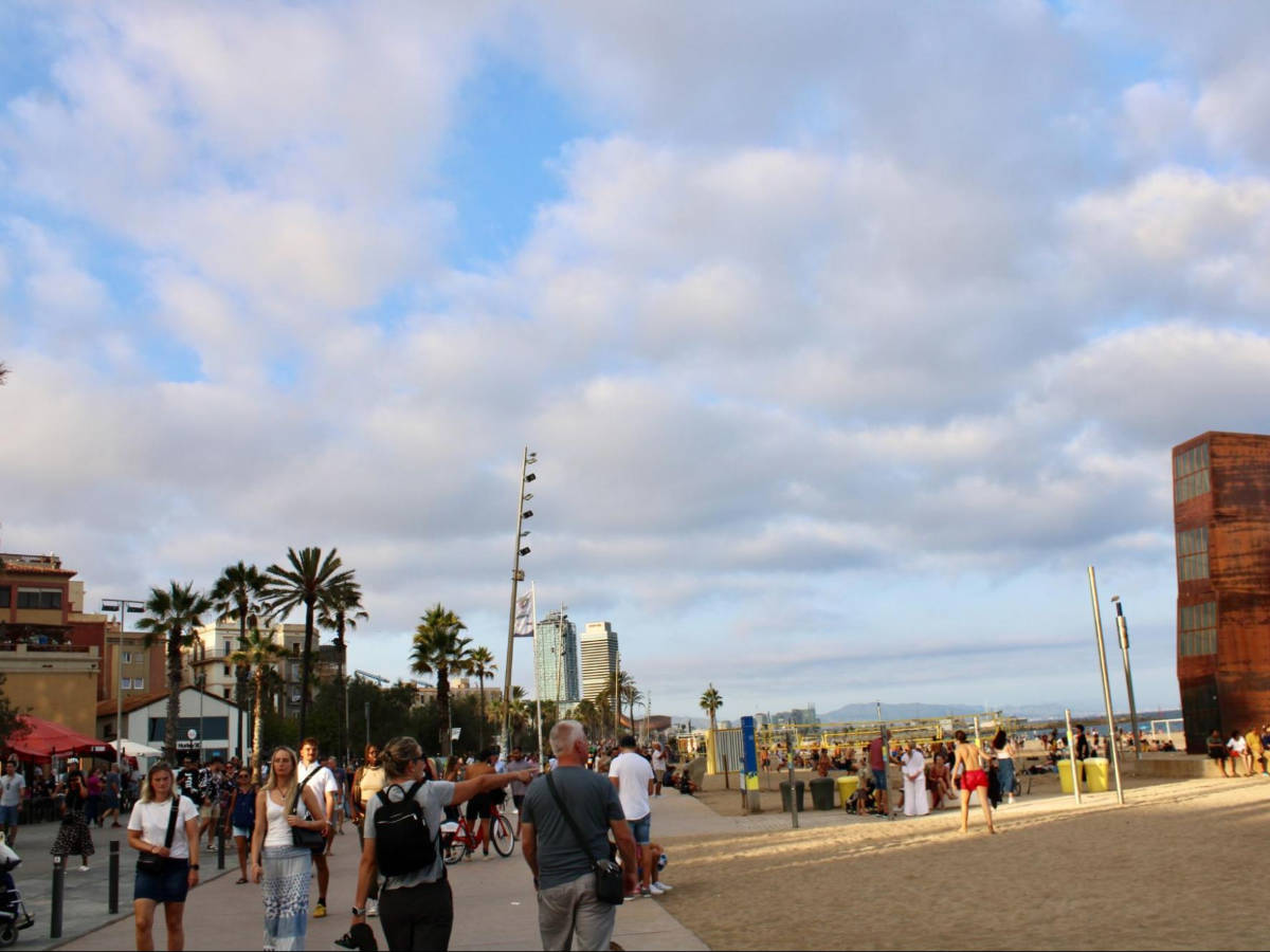 View of the people walking around the La Barceloneta Beach