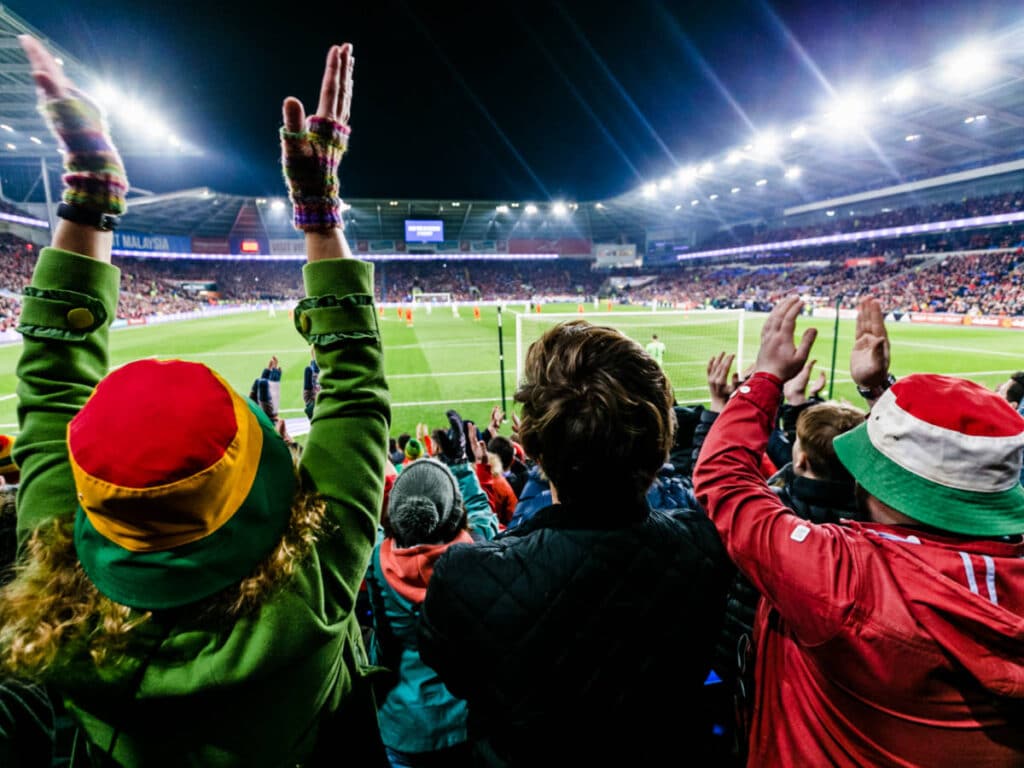 View of the fans watching a game at the Cardiff City Stadium