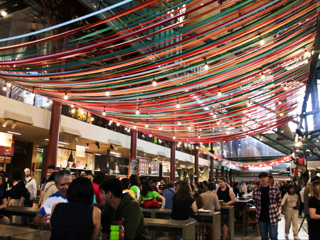 View of the crowd dining inside the Central Market of Florence