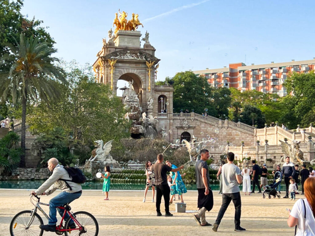 View of the crowd wandering around the iconic fountain at Ciutadella Park