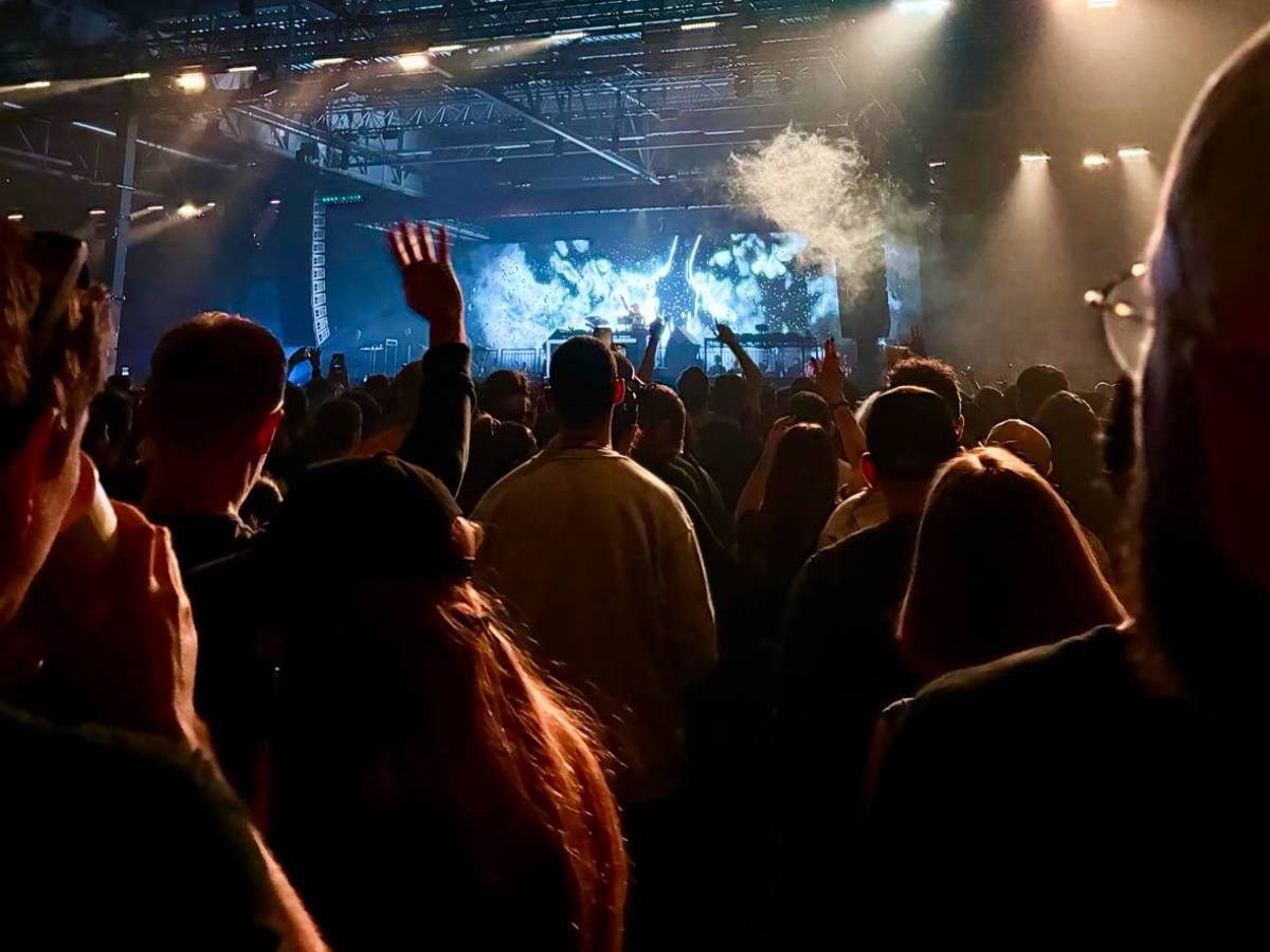 View of the crowd gathering at the Drumsheds