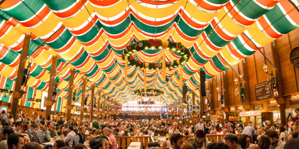 View of the crowd inside the colorful Hippodrom Beer Tent at Oktoberfest