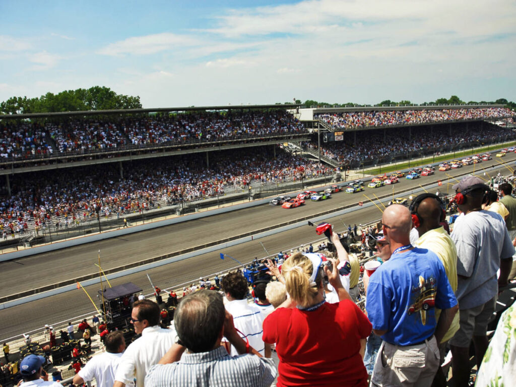 The crowd watching a NASCAR race at the Indianapolis Motor Speedway
