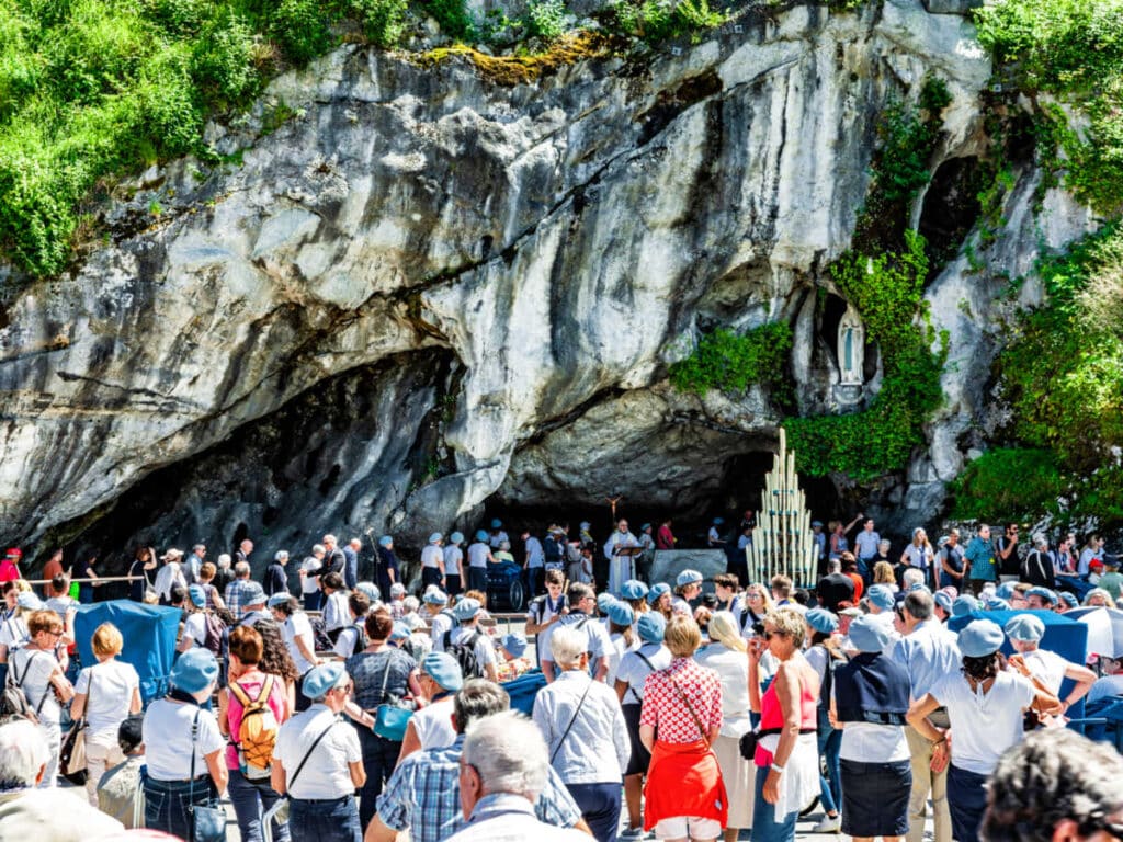 View of the crowd in front of the Marie Grotto at the Cathedral of Our Lady of the Rosary