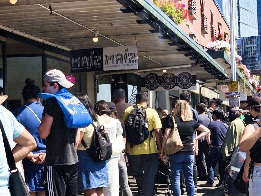 View of the crowd lining up at the Pike Place Market Starbucks