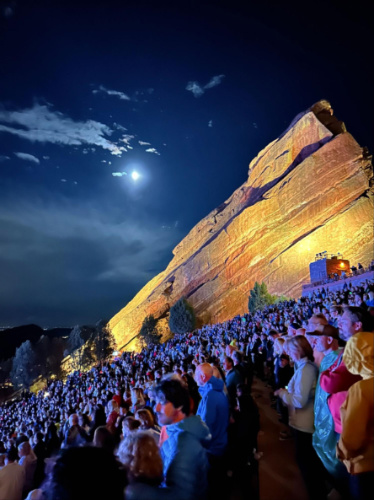 Scenic view from the crowded evening concert in Red Rocks Park & Amphitheatre