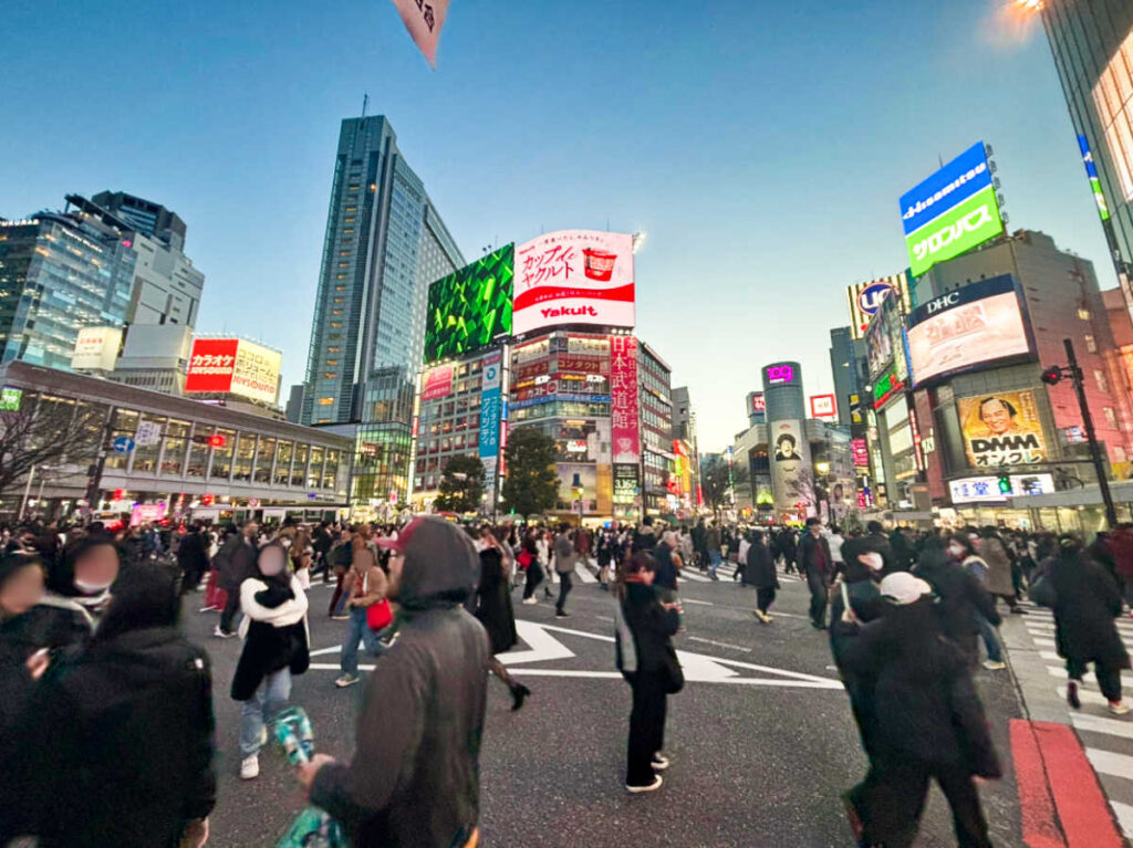 The crowd at the Shibuya Crossing in Japan at night