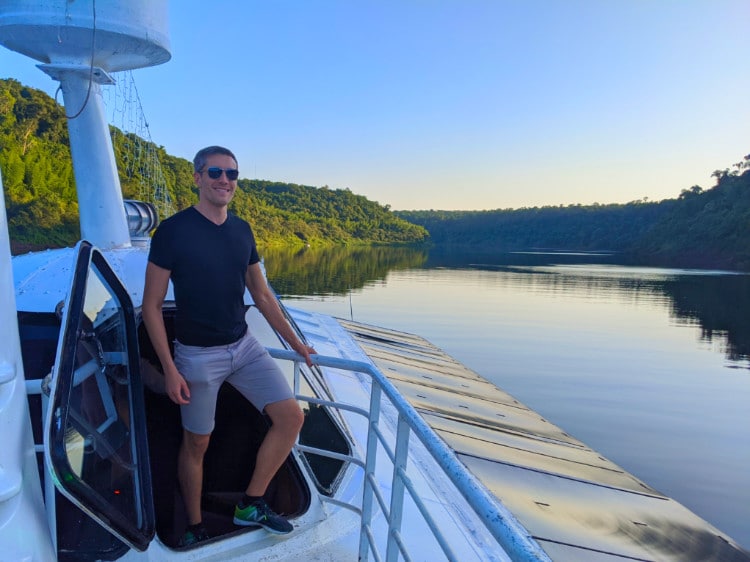 The author Nate Hake on a Cruceros Iguazu catamaran boat
