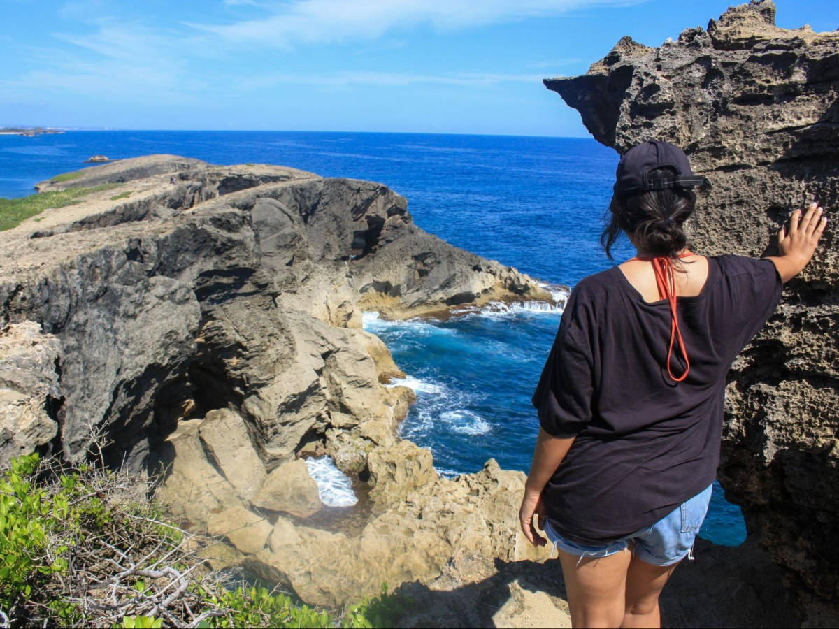 The author Vanessa Ramos admiring the view in Cueva del Indio