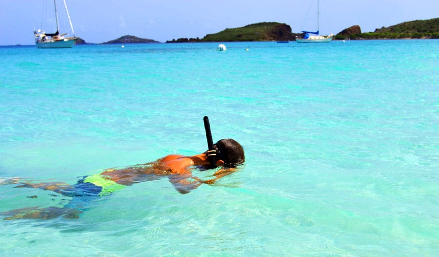 View of a man trying out snorkeling in Culebrita