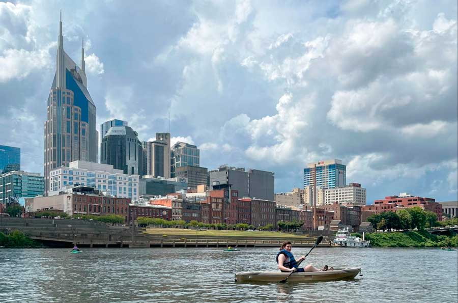 The author kayaking at the river in Downtown Nashville