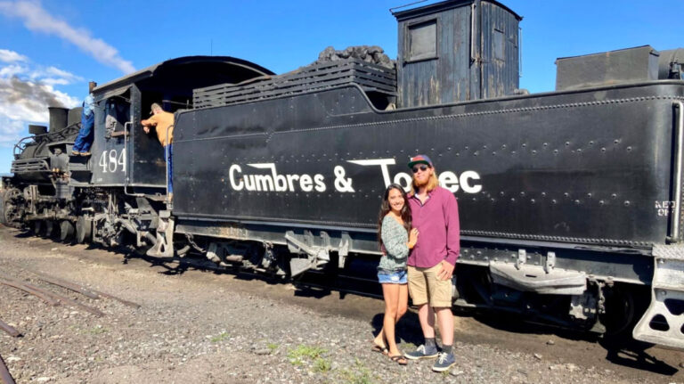 Travel Lemming author Abigail and her husband beside the Cumbres and Toltec Train