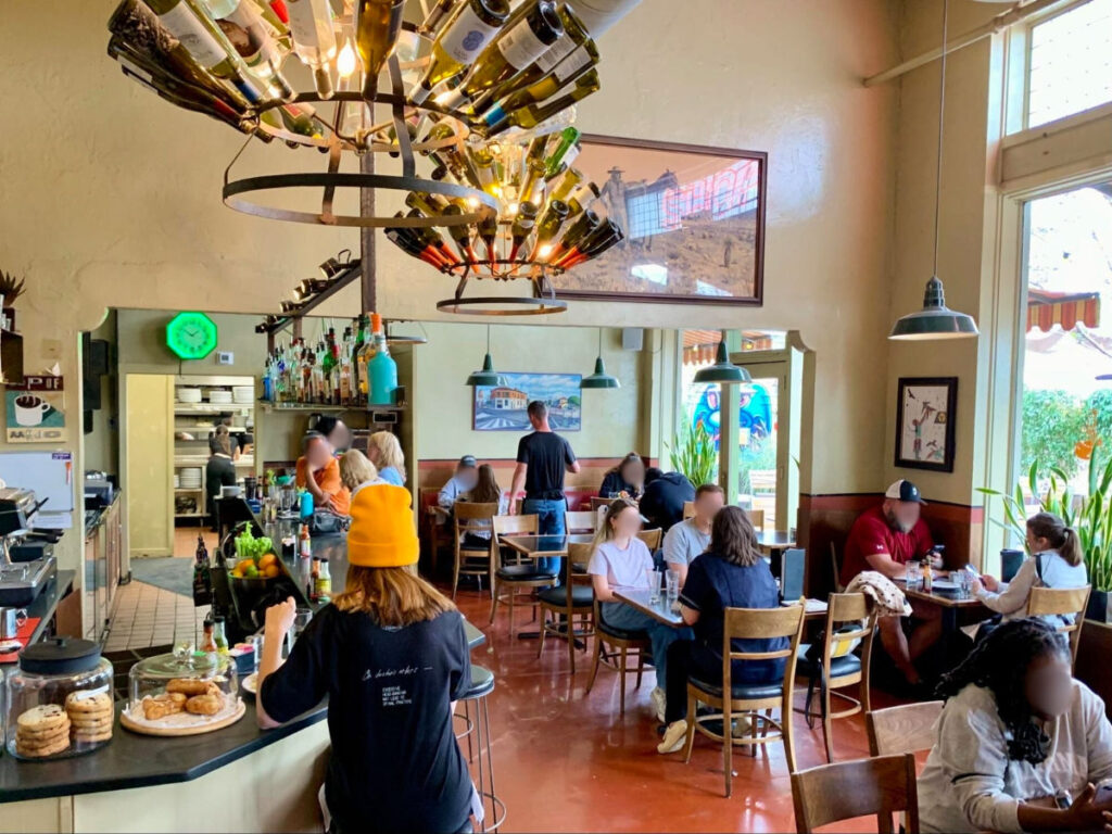 A look inside Cup Cafe where people are enjoying their coffee