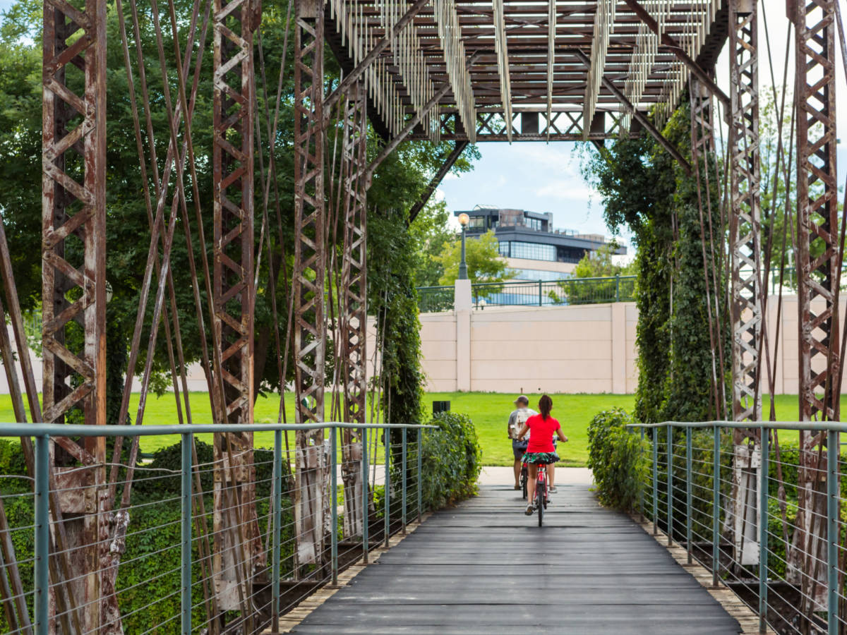 People cycling at the Cherry Creek Regional Trail