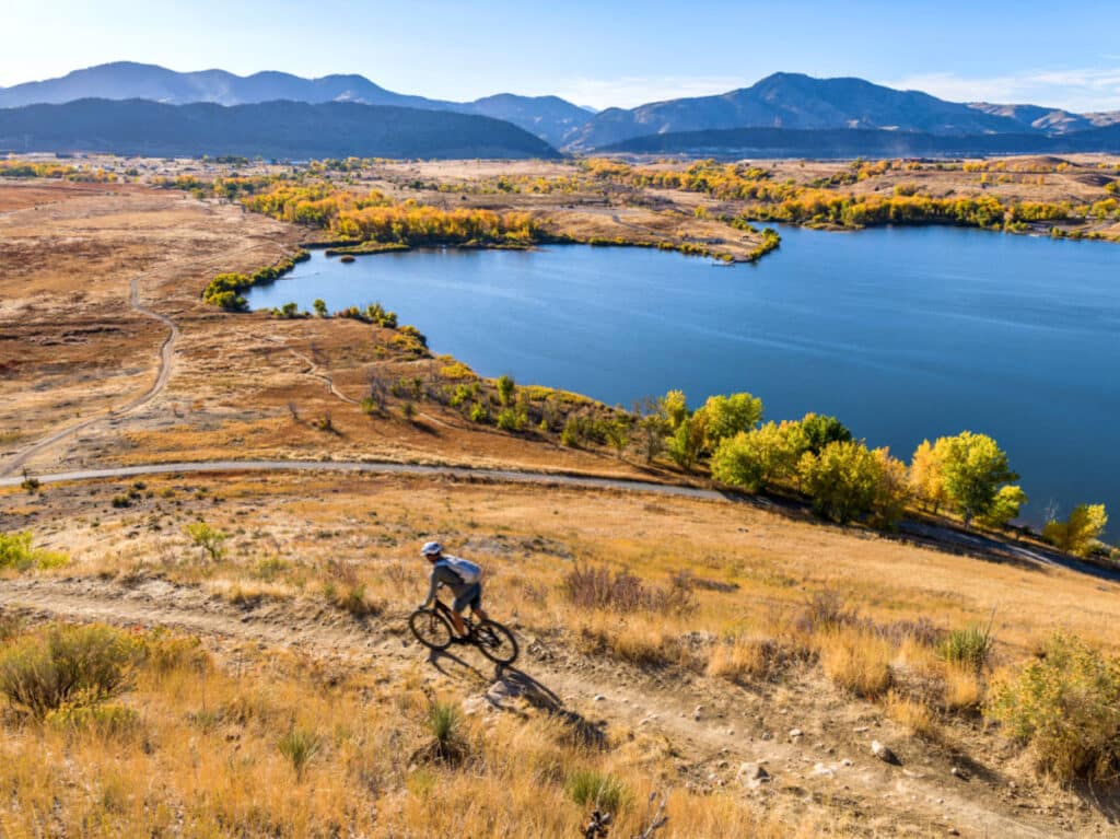 A man mountain biking at Bear Creek Lake Park