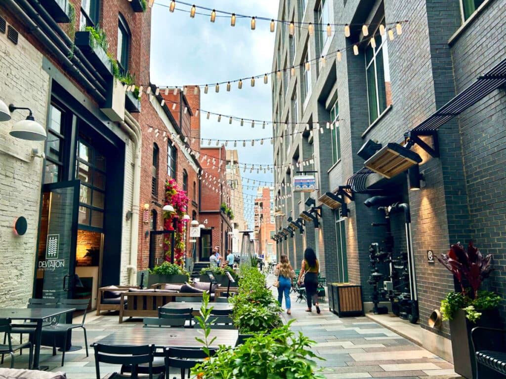 View of the people wandering around the beautiful street in Dairy Block