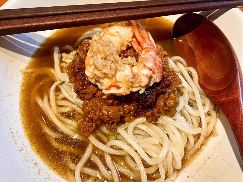 Closeup look of a bowl of house-made Danzai noodles at the Bao Noodle Shop