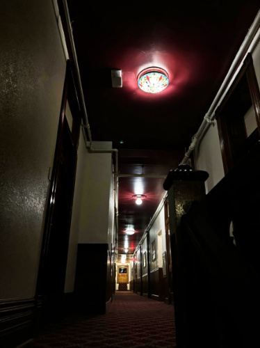 View of the dark hallway inside the Manresa Castle