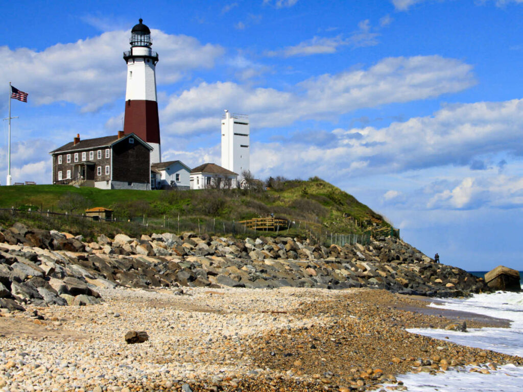 View of the Montauk Point Lighthouse on the cliffside in Long Island