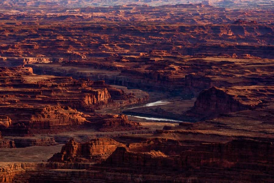 Aerial view of the rock formations and Colorado River from Dead Horse Point State Park at dusk